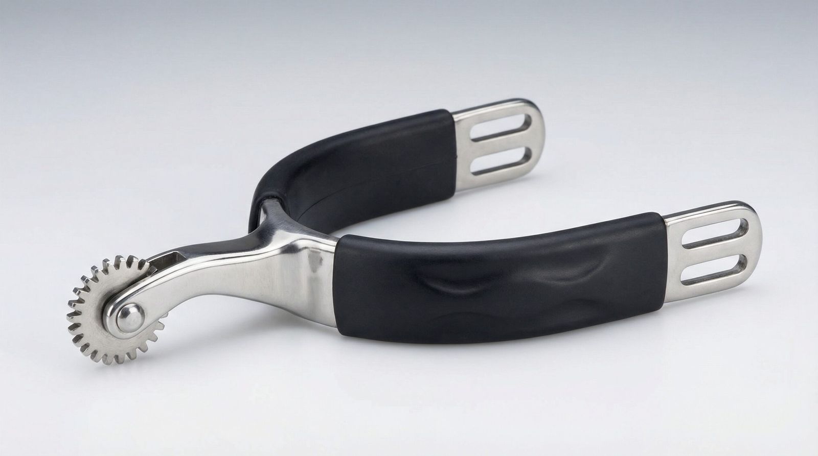 A professional cog rowel spur with a gear-shaped stainless steel wheel and a protective rubberized heel band.