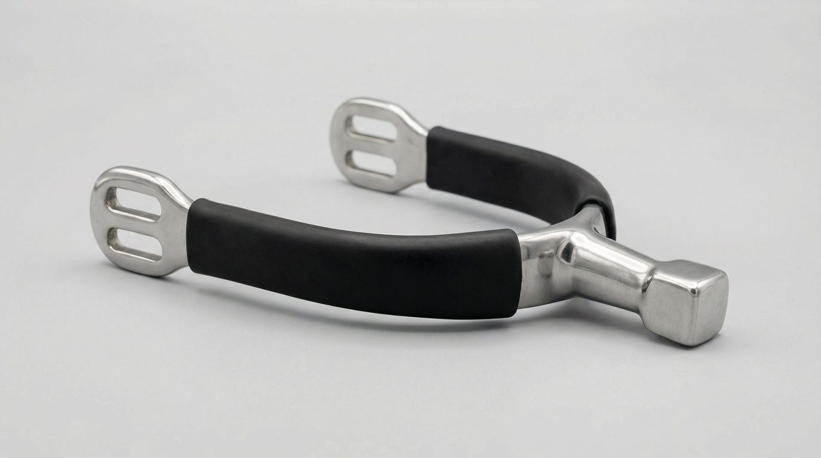 A professional hammerhead horse spur featuring a blunt square neck and a durable stainless steel core.