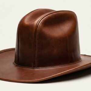 A premium brown leather Sharp Ridge Cowboy Hat featuring a tall crown with severe creases and pronounced raised ridges.
